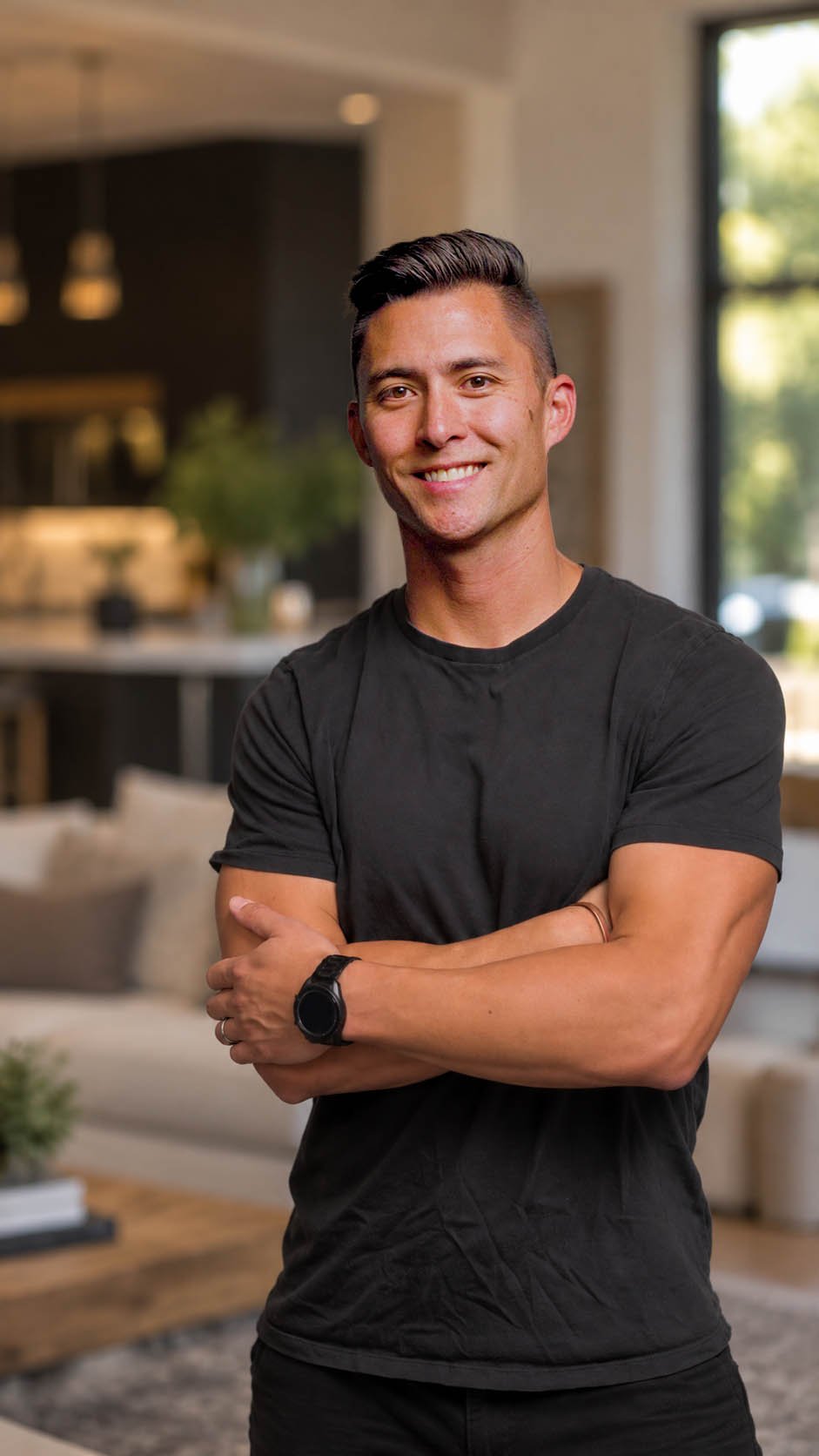 Tim Burmaster, founder of Marin Private Training, standing in a client's living room